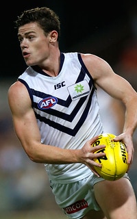 AFL 2014 Rd 16 - Melbourne v Fremantle Lachie Neale of the Dockers in action during the 2014 AFL Round 16 match between the Melbourne Demons and the Fremantle Dockers at TIO Stadium, Darwin on July 05, 2014. (Photo: Michael Willson/AFL Media)